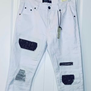 Turnstiles Supply distressed studded jeans sz 32”